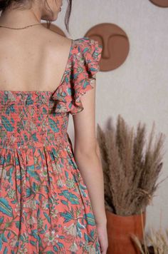 Just like the breeze, this fun short ruffle mini dress is a breath of fresh air. Crafted from 100% cotton cambric, it's as light and airy as a summer day. The floral jaal hand block print dances across the fabric, adding a touch of whimsy to its peach nectar hue. With its easy-to-wear fit & flare silhouette and charming balloon sleeves, this peach mini dress is perfect for casual occasions. With two pockets for practicality, it effortlessly combines style and comfort. Slip into this delightful s Short Sleeves Designs For Dresses, Collar Kurti Design, Peach Nectar, Cute Formal Dresses, Short Frock, Dress With Ruffle Sleeves, Salwar Designs, Desi Fashion Casual, Floral Cotton Dress