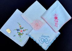 Here is a lovely grouping of 4 vintage Hand Embroidered lace hankies. These hankies measure different sizes so please view pictures closely for sizes. These would make a special gift for a vintage fashion collector. These hankies would also make a wonderful addition to a shabby chic or victorian project. These are vintage items, so therefore they are subject to some aging imperfections. Please view pictures, closely for size and condition. You will receive all 4 hankies shown. Floral Embroidered Handkerchiefs For Spring Wedding, Spring Wedding Handkerchiefs With Floral Embroidery, Vintage Wedding Handkerchiefs For Summer, Vintage Embroidered Wedding Handkerchiefs, Vintage White Handkerchiefs With Lace Work, Vintage White Lace Handkerchiefs, Classic White Embroidered Handkerchiefs, Lace Hankies, Vintage Embroidered Summer Handkerchiefs