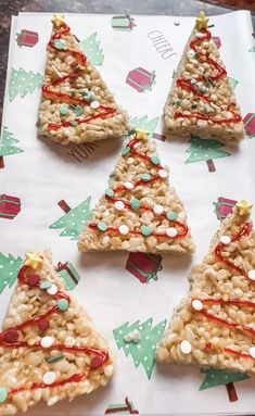 rice krispy treats are arranged in the shape of christmas trees on a paper towel