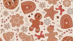 gingerbread cookies and candy canes are arranged on a beige background with stars, snowflakes, and hearts