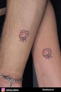 two people with matching tattoos on their arms