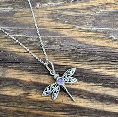 Beautiful and delicate filigree style sterling silver Dragonfly pendant. These gorgeous handmade pendants are exquisitely crafted and each is set with a lovely faceted gemstone. The gemstone will be either garnet, topaz, citrine, amethyst, garnet or peridot depending on supply Buy multiple items and only pay for one shipping cost. 🛍️ Subscribe to our email list for exclusive discounts and GET 20% OFF your next order in our Etsy Shop! Copy and paste this link into your browser to join: https://b Dainty Sterling Silver Dragonfly Jewelry, Dainty Silver Dragonfly Jewelry, Elegant Sterling Silver Dragonfly Necklace, Adjustable Sterling Silver Dragonfly Necklace, Dainty Handmade Silver Butterfly Necklace, Handmade Dainty Silver Butterfly Necklace, Delicate Sterling Silver Pendant Crystal Necklace, Delicate Sterling Silver Filigree Necklaces, Delicate Sterling Silver Filigree Necklace