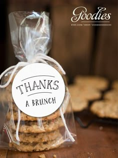 cookies wrapped in plastic and tied to a bag with thank you're a brunch for coming to my birthday party