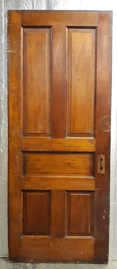 an old wooden door with no glass on it