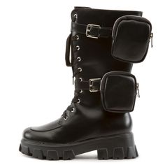 a pair of black boots with buckles on the side and straps at the bottom