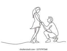 a man kneeling down next to a woman