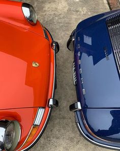 two cars parked next to each other on the street