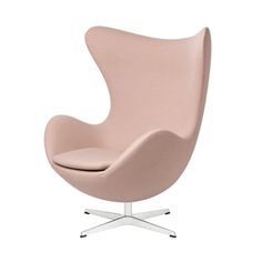 an egg chair with a pink seat and white base