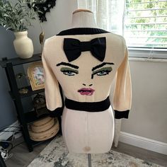 In Beautiful Condition Crop Sweater Size Medium Has Some Stretch To The Weave Not Sure If This Is A Marilyn Face Or The Back But She Came Out With Season Of These So I Couldn’t Find Anything On It Fitted Beige Sweater For Party, Fitted Beige Party Sweater, Cream Party Tops For Winter, Cream Winter Party Top, Betsey Johnson 80s, Betty Boop Sweater, Betsey Johnson 60s, Betsey Johnson Spring Summer 1997, Betsey Johnson Fall/winter 1997