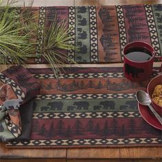 a table topped with two cups of coffee and cereal