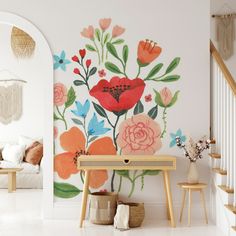 a room with flowers painted on the wall