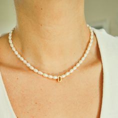 We love personalized jewelry and we know you do too, and this one is a must-have piece. This Pearl Initial Letter Necklace is made by hand with freshwater pearls and 14k gold-filled claps. This personalized design will make feel special to whoever wears it, if you are looking for a gift this one is perfect! Wanna add more letters? click link below https://www.etsy.com/listing/1083060815/extra-letter-and-extra-symbol-for *Personalized pieces take between 2-4 business days to ship* DETAILS: Water Sweet Necklace, Initial Necklace Gold, Gold Bead Bracelets, Monogram Necklace, Initial Bracelet, Initial Letter, Necklace Personalized, Letter Necklace, Feel Special