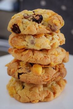 a stack of cookies sitting on top of a white plate