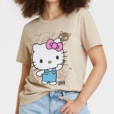 Hello Kitty Short Sleeve T Shirt. Size Large. Brand New Tag Still Attached. Hello Kitty T Shirt, Jeans Joggers, Hello Kitty Halloween, Pink Hello Kitty, Friends Tshirt, Pink Tshirt, Hem Style, Valentines Shirt, Cat Shirts