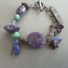 Purple Agate Focal with Charoite Discs, handcrafted pewter link by GreenGirlStudios,  Chinese Turquoise, Amethyst Shards, gunmetal chain and sterling toggle Glass Cat, Purple Agate, Cat Charm, Asheville Nc, Asheville, Czech Glass, Agate, Jewelry Bracelets, Amethyst