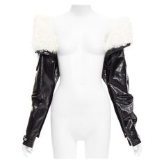 rare SAINT LAURENT Runway black leather white shearling foldover sleeves Reference: NKLL/A00141 Brand: Saint Laurent Designer: Anthony Vaccarello Collection: Runway Material: Leather Color: Black, White Pattern: Solid Closure: Snap Buttons Lining: White Shearling CONDITION: Condition: Excellent, this item was pre-owned and is in excellent condition. Micro scratches at metal hardware. Natural dents on leather. Remarks: Composition label not present. MEASUREMENTS: Sleeve length: 70cm / 27.3" This Saint Laurent item is authentic. Sleeves Reference, Saint Laurent Coat, Saint Laurent Runway, Bb Style, High Fashion Outfits, Anthony Vaccarello, Black Tweed, Black White Pattern, Leather Outfit