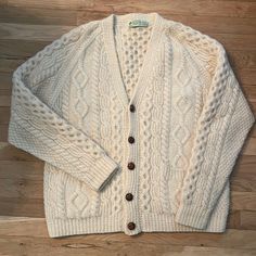 Handknit In Ireland, 100% Wool Cardigan Sweater. Vintage. Slight Spot On Back Left Shoulder. Could Easily Be Brushed Out Most Likely. Very Warm, Can Be Worn As Jacket. Very Thick And Comfortable. No Size, But Fits Xs-L. White Wool V-neck Sweater, Classic White Merino Wool Cardigan, Classic White Wool Cardigan, White Wool Cardigan For Layering, White Merino Wool Knitted Cardigan, Cozy White Wool Cardigan, Classic Knitted Cream Cardigan, Classic Cream Knitted Cardigan, Sweater Vintage