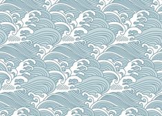 a blue and white wallpaper with waves on it