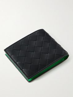 Italian label Bottega Veneta doesn't rely on logos to proclaim its luxury status; instead, the brand lets its signature 'Intrecciato' leather do the talking. With eight slots, two internal pockets and two sleeves, this wallet has ample room for all your cards, notes and receipts. Designer Wallets With Leather Lining For Formal Occasions, Designer Black Wallets With Leather Lining, Designer Bifold Wallets For Formal Occasions, High-end Leather Rectangular Wallet, High-end Rectangular Leather Wallet, Designer Black Bifold Wallet, Designer Bifold Business Wallet, Designer Black Leather Wallet, Designer Bifold Wallet With Leather Lining