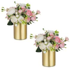 two gold vases filled with pink and white flowers