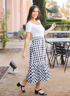 Hey there fashionista! Are you tired of wearing the same old jeans every day? It's time to switch things up and embrace the comfort and style of skirts! And we've got just the perfect one for you - the Gingham Midi Skirt in Pink. This skirt is not only trendy but also super comfortable. You can easily layer it with a tee, a jean jacket, and sandals for a chic spring outfit that feels as comfy as your favorite sweats. With sizes ranging from Small to XL, you can find the perfect fit for you. Our model, who is 5'5" and wears a size 2/4, looks stunning in a small. So why settle for boring jeans when you can rock this adorable Gingham Midi Skirt? Add it to your cart now and get ready to turn heads with your fashion-forward style! Size: Small 0-4 Medium 6-8 Large 10-12 XL 12-14 Casual Fitted Gingham Skirt, Gingham Skirt For Day Out In Spring, Spring Gingham Skirt For Day Out, Trendy Gingham Skirt For Spring, Spring Plaid Relaxed Fit Skirt, Spring Plaid Relaxed Skirt, Casual Gingham Bottoms With Lined Skirt, Everyday Spring Skirt Bottoms, Casual Gingham Mini Skirt