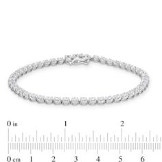 Wrap their wrist in the sparkling luxury of this certified lab-created diamond tennis bracelet. 14K white gold. Single row of prong-set certified lab-created diamonds. 3 ct. t.w. of certified lab-created diamonds. F colour/SI2 clarity with certification card. 7.25-inch bracelet; tongue and groove clasp. Diamond Tennis Bracelet, Tongue And Groove, Tennis Bracelet Diamond, Lab Created Diamonds, Tennis Bracelet, Prong Setting, Tennis, Lab, Diamonds