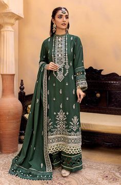 Luxury Green Embroidered Pakistani Salwar Kameez Dupatta Salwar Suit is an elegant festive attire beautifully adorned with hand-worked details of threads, sitara, and motifs. Shimmering details and embroidery give a glamorous touch to the perfectly stitched Kameez Trousers. Pakistani Velvet Dresses, Wedding Velvet, Luxury Green, Asim Jofa, Pakistani Salwar, Raw Silk Fabric, Readymade Saree, Velvet Suit, Pakistani Salwar Kameez