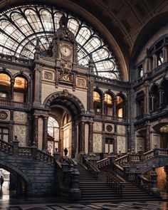 an ornate building with many windows and stairs