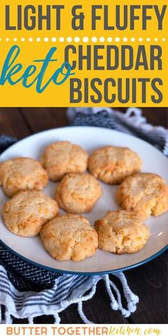 light and fluffy cheddar biscuits on a white plate