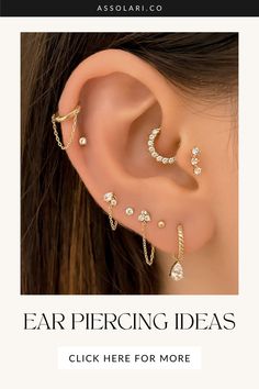 an ear with three different types of piercings on the top and bottom of it