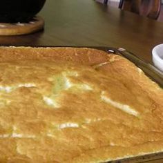 a pancake sitting on top of a wooden table