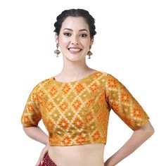 "Beautiful Silk Bandhani Brocade Saree Blouse With Weaving Pattern. Care Instructions: Hand wash seperately Fit Type: Regular This blouse is fully stitched and ready to wear available in many sizes and colours The sleeves are 10.5\" long and the blouse is 15\" in length The fabric used is a very soft bandhni brocade from Benaras This blouse opens from the back with hook and eye and is lined with pure cotton It has a boat neck and ample of margins are provided inside. PRODUCT DETAILS Auction For: Saree Bluse, Haldi Wear, Brocade Saree, Sari Design, Brocade Blouse, Designer Saree Blouse, Brocade Blouses, Gold Blouse, Indian Wedding Wear