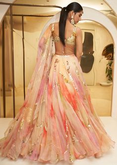 Multicolor Organza Choli With Intricate Embroidery, Multicolor Organza Dress With Sheer Dupatta, Multicolor Tissue Silk Dress For Wedding, Multicolor Tissue Silk Wedding Dress, Multicolor Organza Lehenga With Intricate Embroidery, Festive Multicolor Organza Gown, Multicolor Organza Wedding Gown, Multicolor Wedding Gown With Sheer Dupatta, Multicolor Floor-length Organza Sets