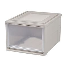 a white plastic box with an open door on the front and bottom side, for storage