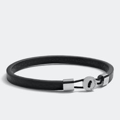 Juno Bracelet for Men - Full-Grain Leather with Sterling Silver Plated Closure, Minimalist Men's Jewelry, Perfect Gift for Him The Juno Bracelet is meticulously crafted from full-grain leather, featuring a simple sterling silver plated closure and matching crimps. This frictionless band epitomizes pared-down minimalism, offering a masculine and unobtrusive design that can be easily dressed up for formal occasions or worn solo for a sleek, modern look. Key Features: Premium Materials: Full-grain Minimalist Leather Bracelet With Adjustable Stainless Steel Clasp, Classic Adjustable Leather Bracelet For Business, Minimalist Everyday Leather Bracelet With Stainless Steel Clasp, Masculine Leather Bracelet For Everyday, Modern Everyday Bracelets With Wrist Strap, Modern Everyday Bracelets, Leather Bracelet For Men, Minimalist Men, Mens Leather Bracelet