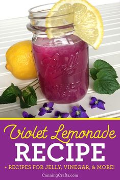 a mason jar filled with lemonade and purple liquid