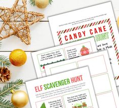 three printable christmas candy cane hunt cards with pine cones and ornaments on the table