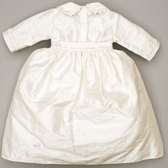 An Elegant and Prim Christening Gown, Designed according to the Traditional Spanish baptism outfits, Made with 100% Silk Shantung fabric features HandMade embellishments on chest, skirt, Sleeves a bonnet. 3 Pieces Outfit: Removable Skirt - Jumpsuit - Bonnet. Matching Shoes and Garment Bag included. ( Shoes might vary from the display picture, but, we will always ship matching shoes) Please take care of it and pass it on generation to generation to come. -Unique design -HandMade (all our outfits Classic White Baptism Dress For Ceremonies, Classic Cream Baptism Dress For Wedding, Classic White Baptism Dress, Classic Cream Baptism Dress, Classic Cream Baptism Dress For Formal Occasion, Christening Gowns For Boys, Boy Christening Outfit, Outfit For Boys, Baby Boy Christening