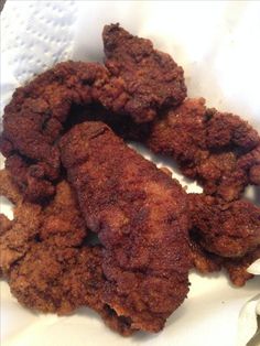 some fried food is on a white plate