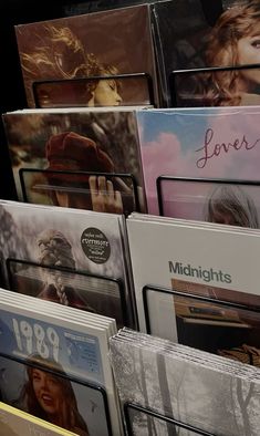 there are many cd's on display in the store, including one that is for sale