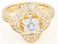 Bella Luce® white diamond simulant 3.08ctw octagon, baguette, and round, Eterno™ 18k yellow gold over sterling silver asscher cut ring. Measures approximately 0.81" L x 0.63" W and is not sizable. Diamond equivalent weight is 1.87ctw. Gold Octagon Jewelry With Halo Setting, Gold Octagon Cubic Zirconia Ring, Gia Certified Gold Jewelry With Baguette Cut, Gia Certified Gold Baguette Cut Jewelry, Gia Certified Baguette Cut Gold Jewelry, Asscher Cut Ring, Asscher Cut, Diamond Simulant, White Diamond