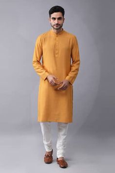 Mustard yellow tie and dye bundi with placement hand embroidery. Paired with a kurta and pyjama. - Aza Fashions Yellow Naqshi Straight Kurta Traditional Wear, Yellow Naqshi Kurta For Eid, Yellow Straight Kurta With Naqshi, Yellow Traditional Wear With Naqshi And Long Sleeves, Yellow Naqshi Straight Kurta, Yellow Naqshi Kurta, Cotton Bandhgala With Dabka For Puja, Yellow Long Sleeve Traditional Wear With Naqshi, Yellow Long Sleeve Kurta For Puja