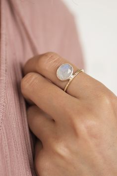 Start tab labels Description Details Shipping and Returns Start tab content Worn alone or stacked, this glowing handcrafted moonstone ring will be your new best friend. Moonstone is known as the protector against negativity and misfortunes. R71-6865M 14K gold filled or solid 14k gold hammered ring band and sterling silver bezel, faceted oval moonstone Each ring is made to order and cannot be resized. If you're at all unsure of your ring size, you may want to order this ring sizer that ships free Minimalist Moonstone Ring For Healing, Healing Minimalist Moonstone Ring, Delicate Adjustable Moonstone Ring, Spiritual Stackable Moonstone Jewelry, Adjustable Stackable Moonstone Ring Spiritual, Ethereal Moonstone Birthstone Ring, Adjustable Stackable Spiritual Moonstone Ring, Celestial Moonstone Stackable Rings, Celestial Style Stackable Moonstone Ring