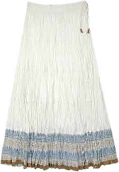 A beautiful multi-panel long skirt with white body in a slightly flouncy and light fabric. The skirt has an elastic waist with a tassel drawstring. #tlb #MaxiSkirt #Printed #WhiteSkirt #FairyCoreSkirt Spring White Skirt With Tassels, White Tassel Skirt For Spring, Long Beach Skirt With Tassels, White Bottoms With Tassels For Spring, Beach Long Skirt With Tassels, White Skirts Long, Bohemian White Maxi Skirt With Gathered Detail, Bohemian White Gathered Maxi Skirt, White Pleated Maxi Skirt For Beach