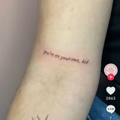 a tattoo saying you're on your own, kid