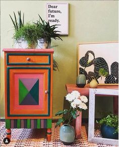 an assortment of potted plants sit next to each other on top of small tables