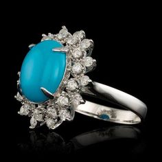 3.90 Carats Impressive Natural Turquoise and Diamond 14K Solid White Gold Ring Total Natural Oval Turquoise Weight is: Approx. 3.20 Carats Turquoise Measures: 12.00 x 10.00mm Natural Round Diamonds Weight: Approx. 0.70 Carats (color G-H / Clarity SI1-SI2) Ring total weight: 5.3 grams Disclaimer: all weights, measurements and colors are approximate and may vary slightly from the listed dimensions or as seen in the image. All pictures are magnified to show the smallest of details. Please, refer to Emerald Cut Aquamarine Ring, Emerald Cut Rings, Etsy Gold Ring, Blue Zircon, White Gold Ring, Natural Turquoise, Quality Diamonds, Yellow Gold Rings, White Gold Rings