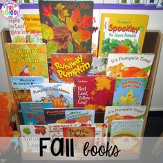 a pile of children's books sitting on top of a table next to each other