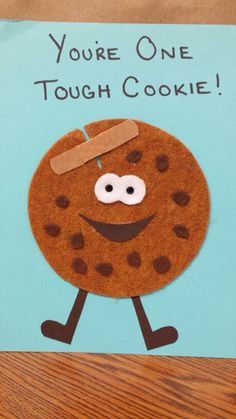 a handmade cookie card that says, you're one tough cookie