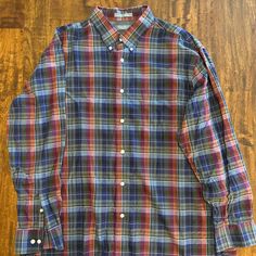 This Cremieux Sport Shirt Features A Blend Of Plum, Royal Blue, Emerald, Burnt Orange, And Gold Colors To Combine Into A Rich Plaid Pattern. It Has Been Wore Three Times And Is In ‘Like-New’ Condition. It Has A Button-Collar With High Quality Buttons Throughout The Shirt. It Pairs Excellently With A Matching Sweater In The Cooler Seasons. Nwot Casual Plaid Cotton Dress Shirt, Casual Plaid Long Sleeve Dress Shirt, Classic Multicolor Long Sleeve Tops, Blue Cotton Dress Shirt For Fall, Blue Fitted Long Sleeve Flannel Shirt, Fitted Long Sleeve Casual Flannel Shirt, Blue Long Sleeve Dress Shirt For Fall, Casual Plaid Collared Dress Shirt, Classic Multicolor Shirt For Fall